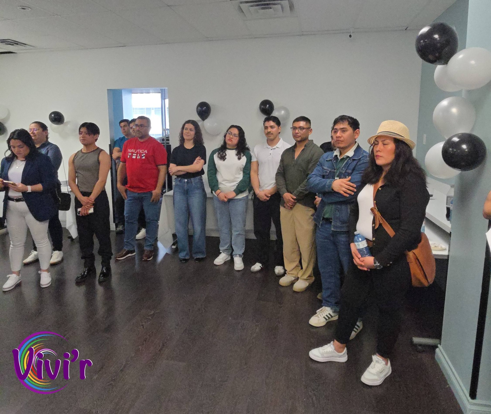 Group portrait with balloons at an event