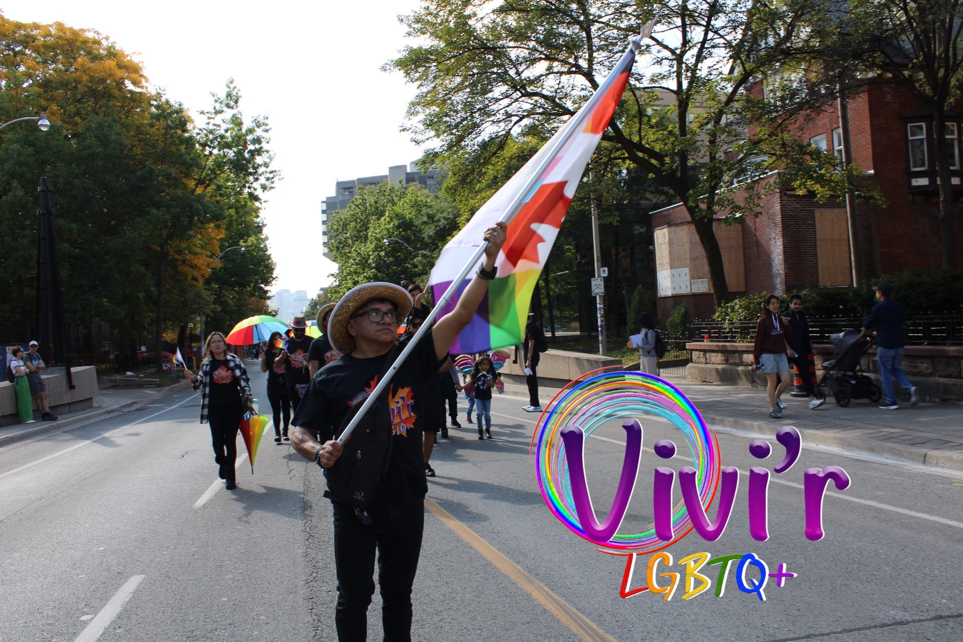 Flag bearer leading the Pride march